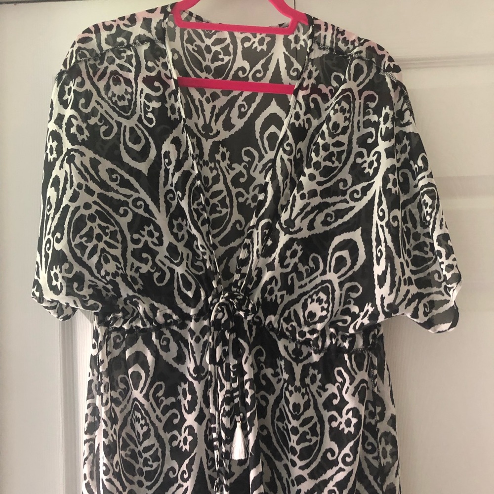 Sheer ankle length cover up with tie waist.